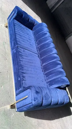 Blue velvet sofa from our cleaning work