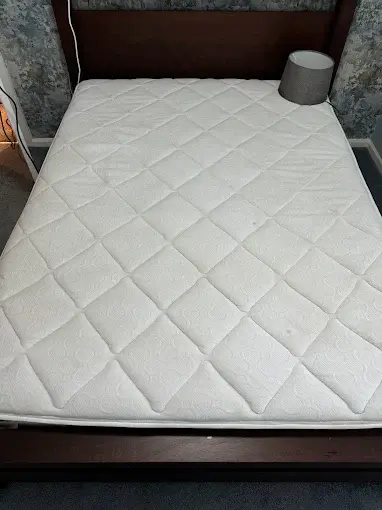 Clean white quilted mattress