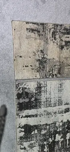 Close view of the abstract rug's pattern and edges